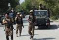 Bombs kill at least 12, wound dozens at Pakistan court